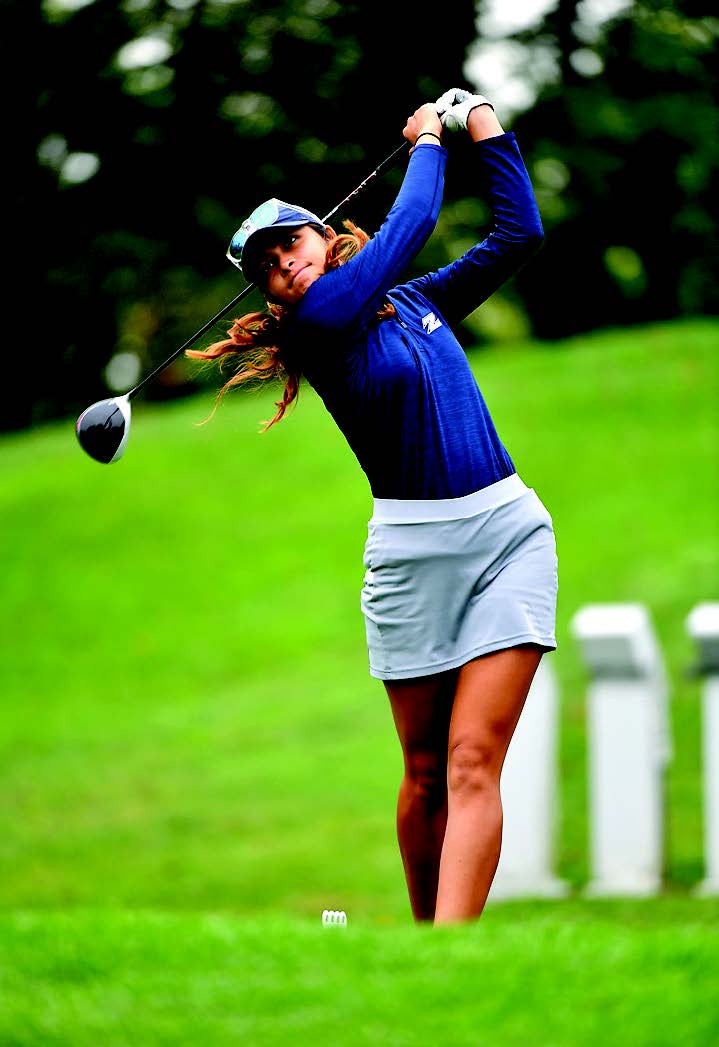 UA student-athlete, Ivana Shah, practices her golf swing